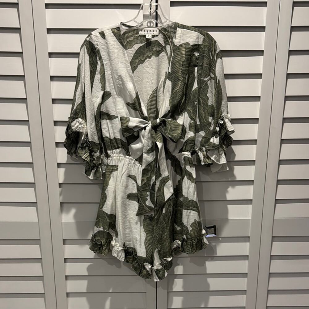 BigHit Fashion Tropical cut Out Ruffles Romper with front Tie.